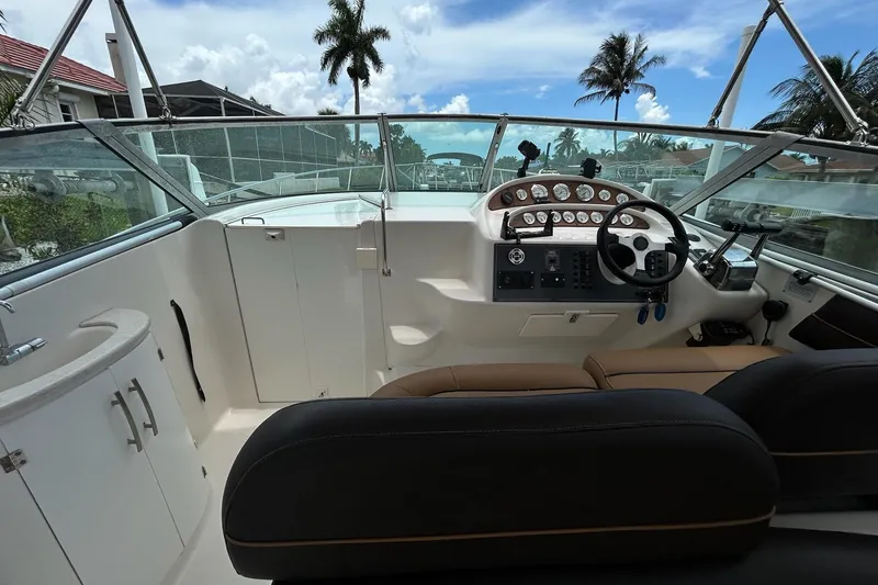 Slide: The Image of Cockpit of 2000 Monterey 330 Sport Yacht with steering wheel and instrument panel. - 14
