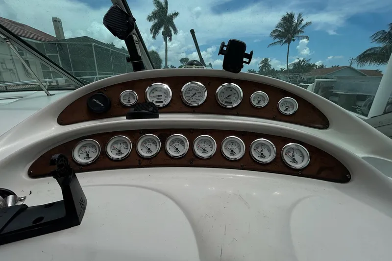 Slide: The Image of Dashboard of a 2000 Monterey 330 Sport Yacht with gauges and controls. - 23