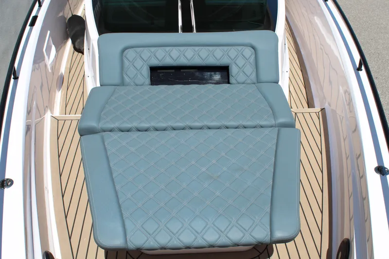 Slide: The Image of 2022 Axopar 37 XC Cross Cabin Brabus with cushioned deck seating. - 41