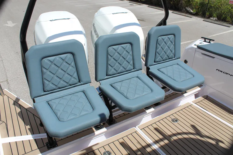 Slide: The Image of 2022 Axopar 37 XC Cross Cabin Brabus, rear seating and dual outboard engines. - 21