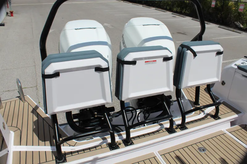 Slide: The Image of Axopar 37 XC Cross Cabin Brabus 2022 boat with dual outboard engines and seating. - 18