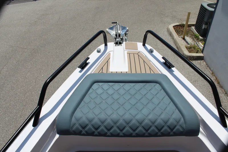 Slide: The Image of Bow seating area of 2022 Axopar 37 XC Cross Cabin Brabus with diamond-stitched upholstery. - 43