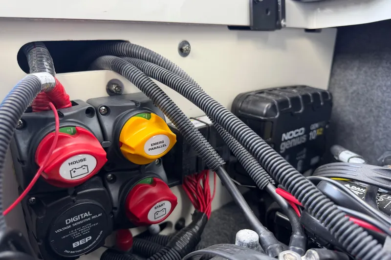 Slide: The Image of 2024 Yamaha Boats 222XD electrical system with battery switches and wiring. - 66
