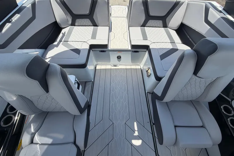 Slide: The Image of 2024 Yamaha Boats 222XD interior with gray seating and modern design. - 58