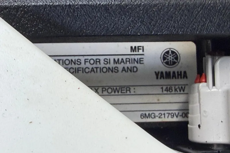 Slide: The Image of Label on 2024 Yamaha Boats 222XD, displaying specifications and power details. - 90