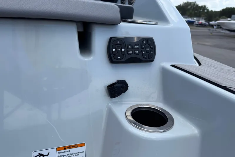 Slide: The Image of 2024 Yamaha Boats 222XD control panel and cup holder detail. - 78