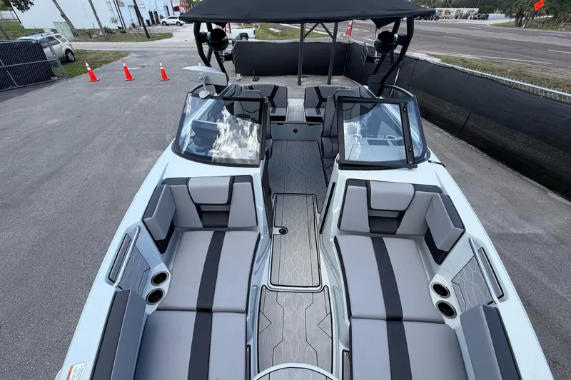 Slide: The Image of 2024 Yamaha Boats 222XD interior with sleek seating and modern design. - 51