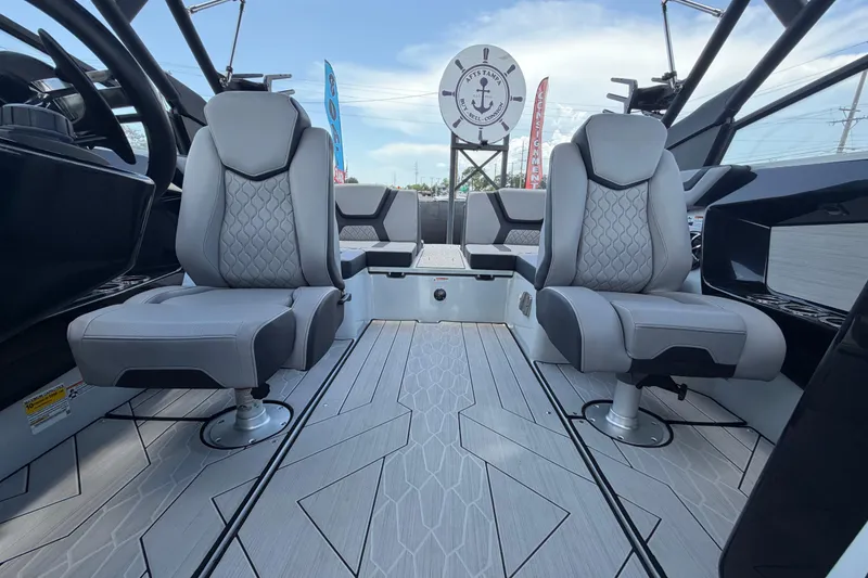 Slide: The Image of 2024 Yamaha Boats 222XD interior with modern seating and sleek design. - 55