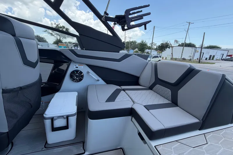 Slide: The Image of 2024 Yamaha Boats 222XD interior with sleek seating and modern design. - 61