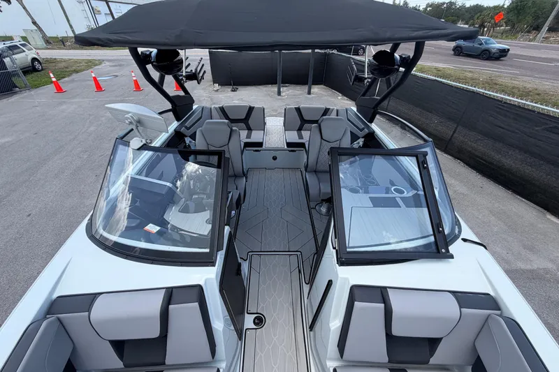 Slide: The Image of 2024 Yamaha Boats 222XD interior with sleek seating and modern design. - 53