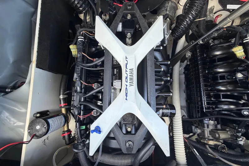 Slide: The Image of Engine compartment of 2024 Yamaha Boats 222XD, showcasing high output components. - 71