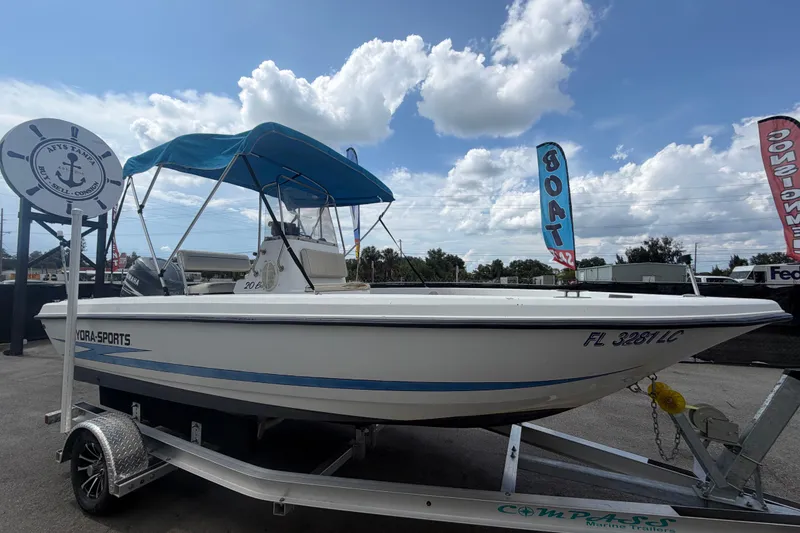 The Image of 1999 Hydra-Sports 2000 CC boat on trailer under blue sky. - 0