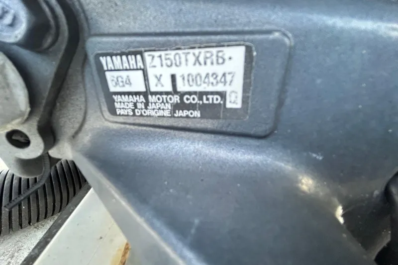 Slide: The Image of Close-up of a Yamaha motor label on a 1999 Hydra-Sports 2000 CC boat. - 47