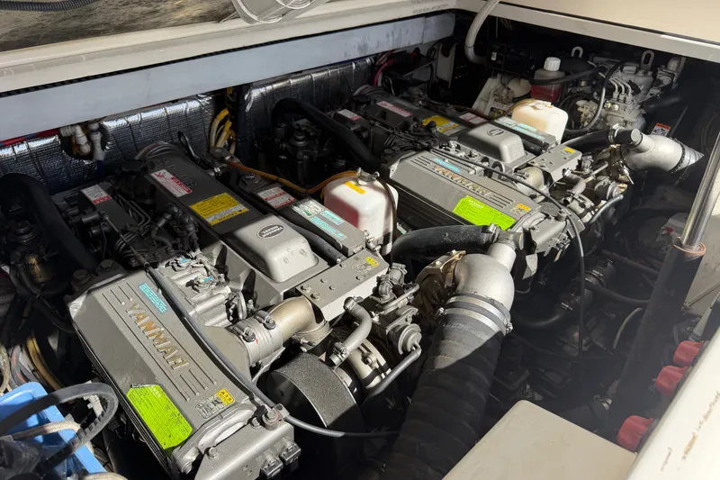 Slide: The Image of Engine compartment of a 2007 Rampage 30 Express boat with Yanmar engines. - 55