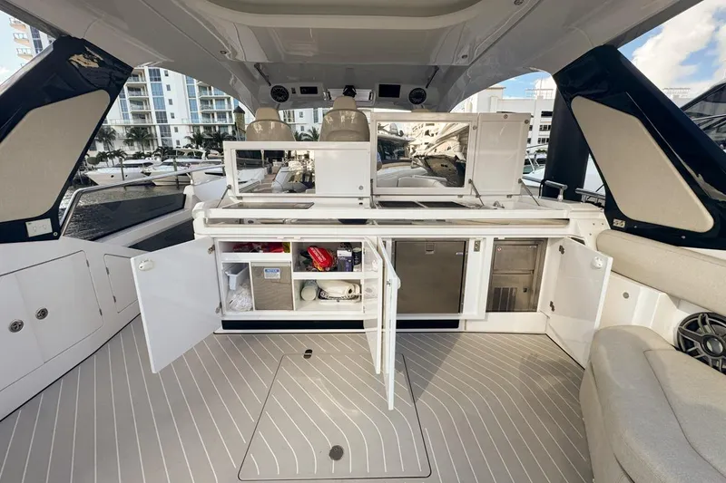 Slide: The Image of 2023 Azimut Verve 47 yacht interior with open storage and modern amenities. - 23