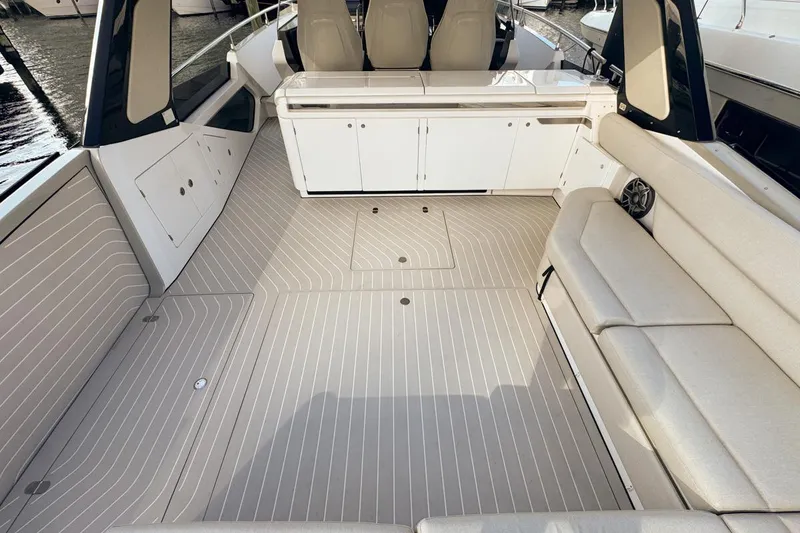 Slide: The Image of 2023 Azimut Verve 47 yacht interior with sleek seating and modern design. - 16