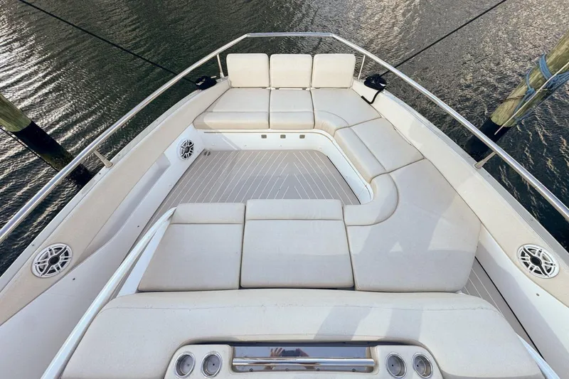 Slide: The Image of Luxurious seating area on 2023 Azimut Verve 47 yacht, featuring elegant white cushions. - 47