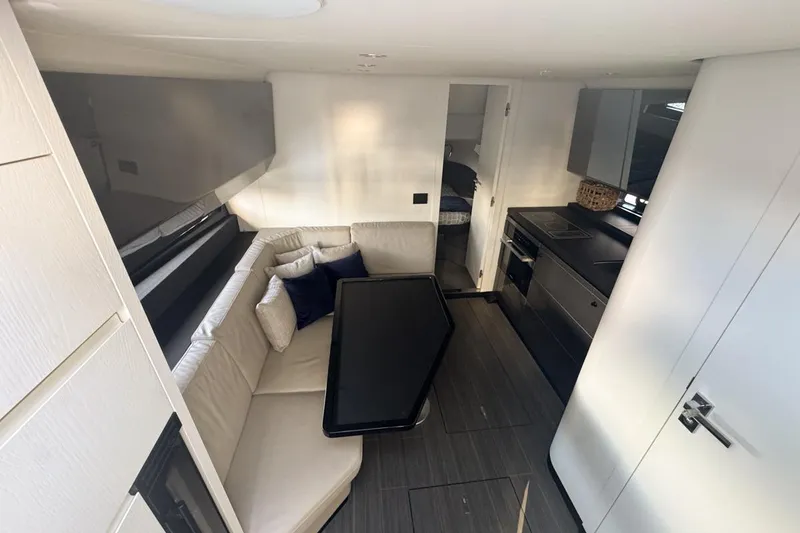 Slide: The Image of Luxurious interior of 2023 Azimut Verve 47 yacht with modern kitchen and seating area. - 73