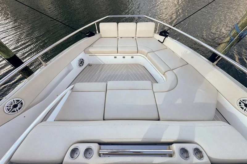 Slide: The Image of Luxurious seating area on 2023 Azimut Verve 47 yacht, featuring plush cushions and sleek design. - 48