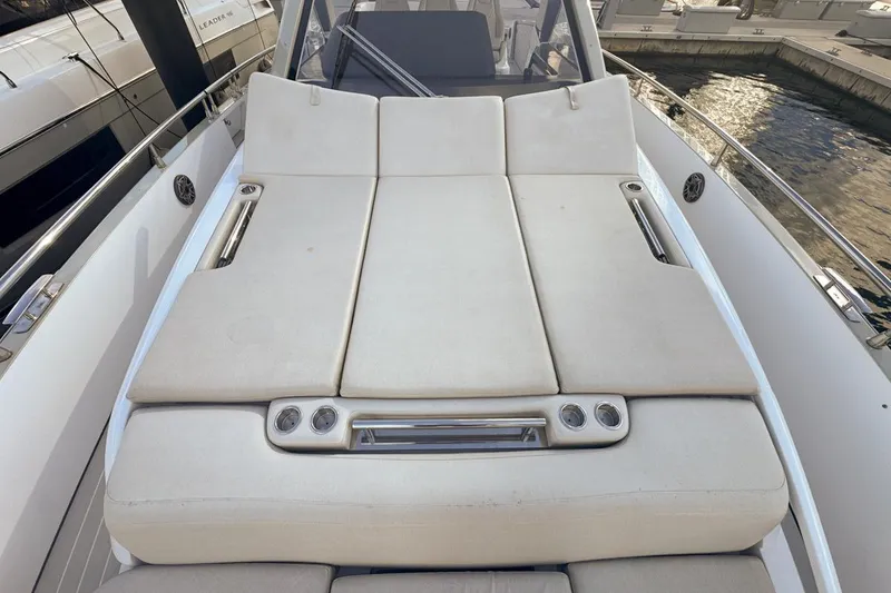 Slide: The Image of 2023 Azimut Verve 47 yacht with luxurious sunbed on deck. - 53