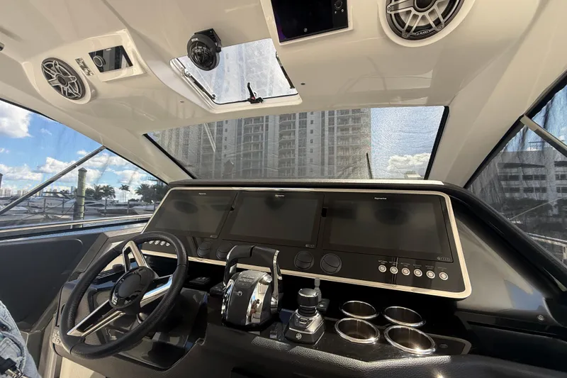 Slide: The Image of Interior cockpit of 2023 Azimut Verve 47 yacht with modern controls and steering wheel. - 41