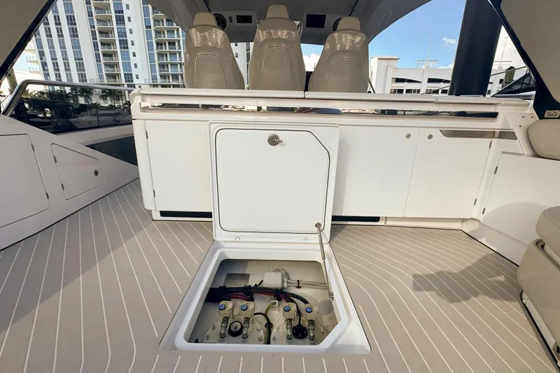 Slide: The Image of 2023 Azimut Verve 47 yacht interior with open hatch and sleek seating. - 26