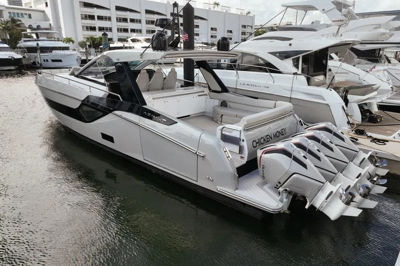 The Image of 2023 Azimut Verve 47 luxury yacht docked, featuring sleek design and powerful engines. - 0