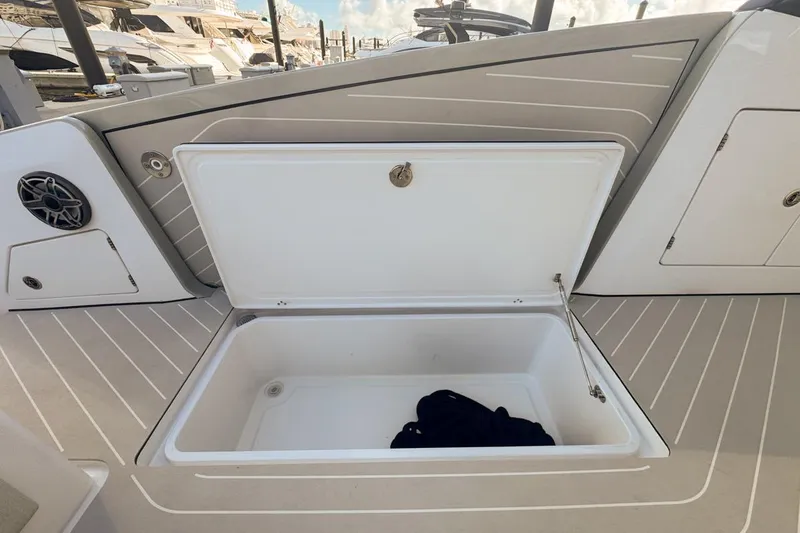 Slide: The Image of Open storage compartment on 2023 Azimut Verve 47 yacht deck. - 33