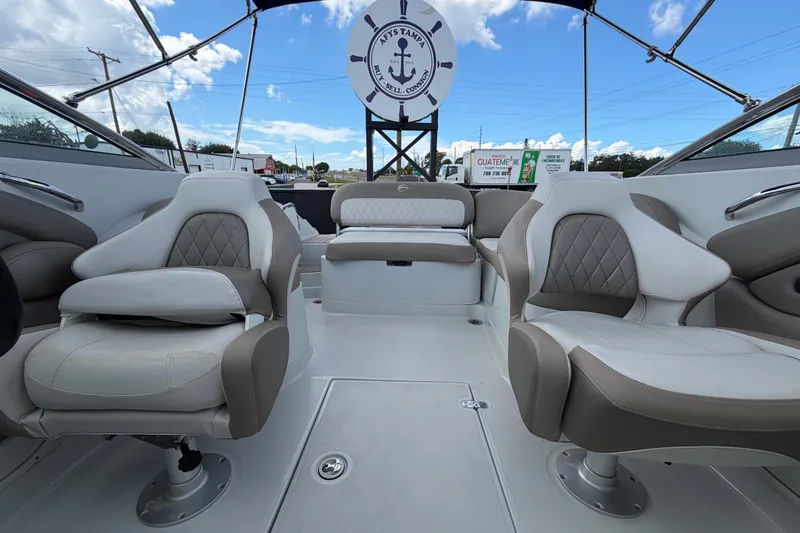 Slide: The Image of 2023 Crownline Eclipse E235 XS boat interior with plush seating and modern design. - 59