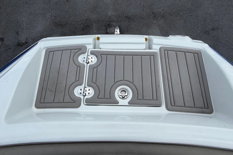 Slide: The Image of The image shows a gray, textured swim platform on a boat. - 48