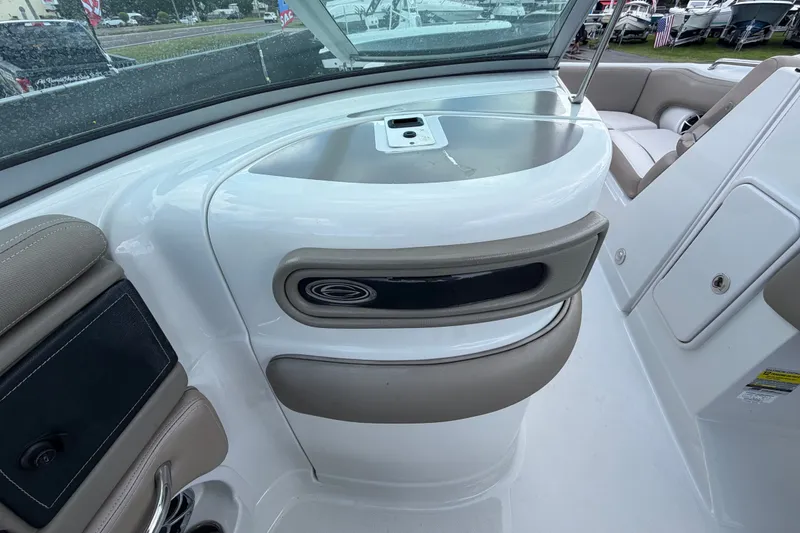 Slide: The Image of 2023 Crownline Eclipse E235 XS boat interior with sleek seating and modern design. - 25