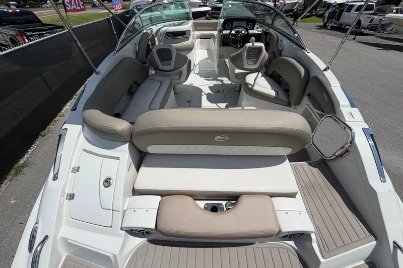 Slide: The Image of 2023 Crownline Eclipse E235 XS boat interior with spacious seating and modern design. - 12