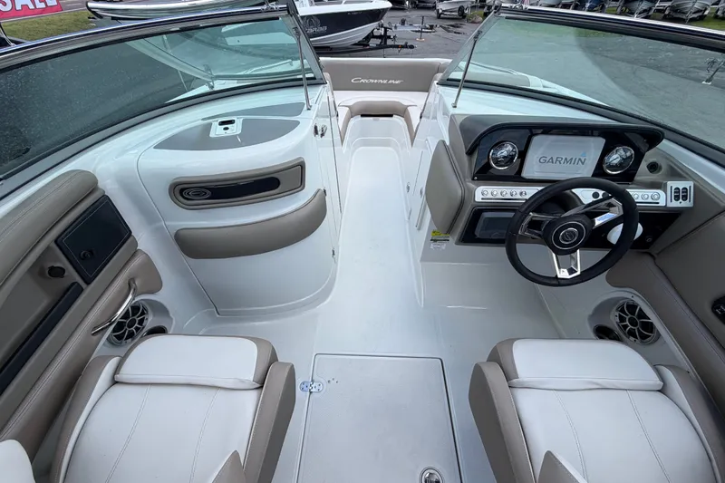 Slide: The Image of 2023 Crownline Eclipse E235 XS boat interior with Garmin navigation system. - 23