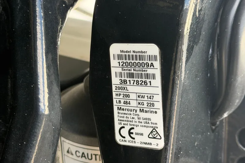 Slide: The Image of Label on Mercury Marine engine, model 12000009A, serial 3B178261, 200 HP, 2023 Crownline Eclipse E235 XS. - 75