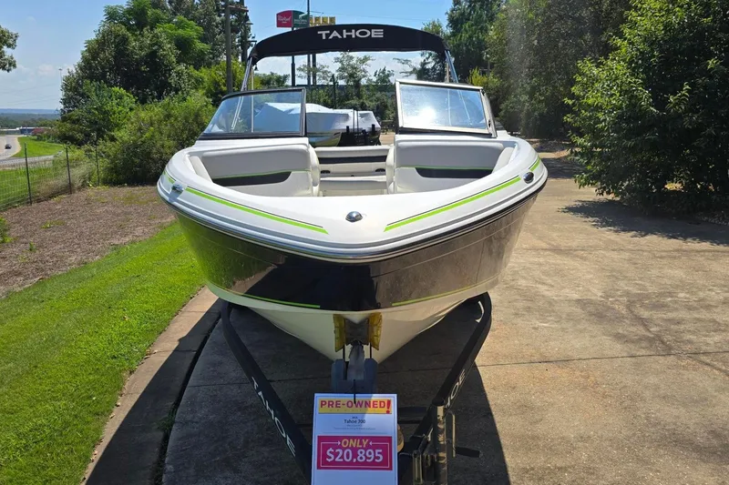 Slide: The Image of 2018 Tahoe 700 boat for sale, pre-owned, priced at $20,895, displayed outdoors. - 8