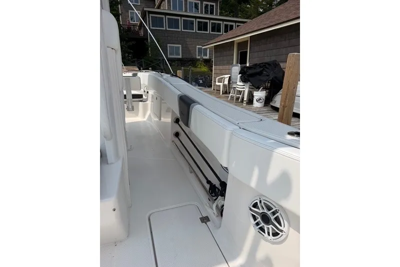 Slide: The Image of 2026 Robalo R270 Center Console boat interior with seating and speaker. - 31