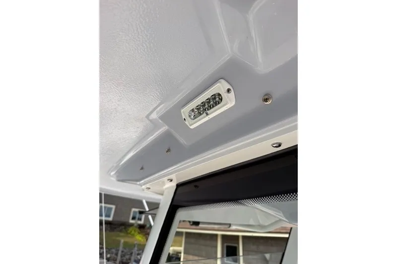 Slide: The Image of 2026 Robalo R270 Center Console interior ceiling light detail. - 42