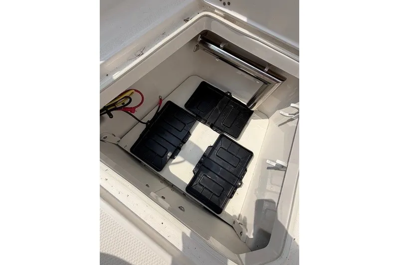 Slide: The Image of Battery compartment of 2026 Robalo R270 Center Console boat. - 41