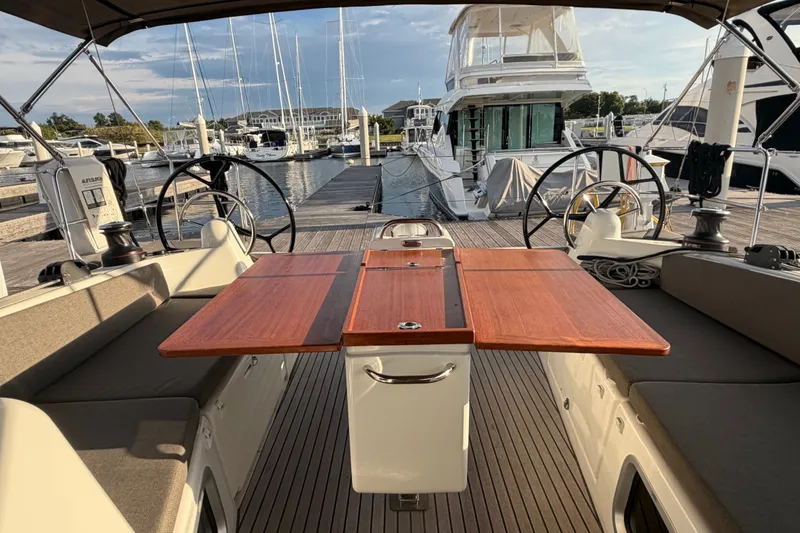 Slide: The Image of Cockpit view of 2024 Jeanneau Sun Odyssey 410 yacht at marina dock. - 31