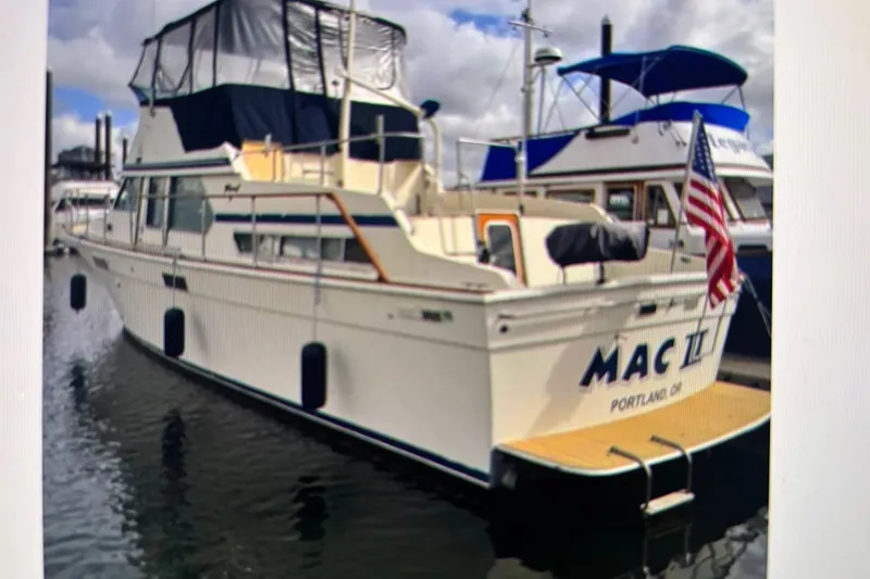 The Image of 1979 Tollycraft 40 Tri-Cabin Motor Yacht docked, displaying American flag, Portland, Oregon. - 21