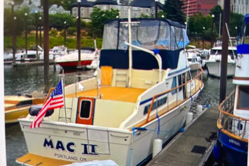 Slide: The Image of 1979 Tollycraft 40 Tri-Cabin Motor Yacht docked in Portland marina. - 17