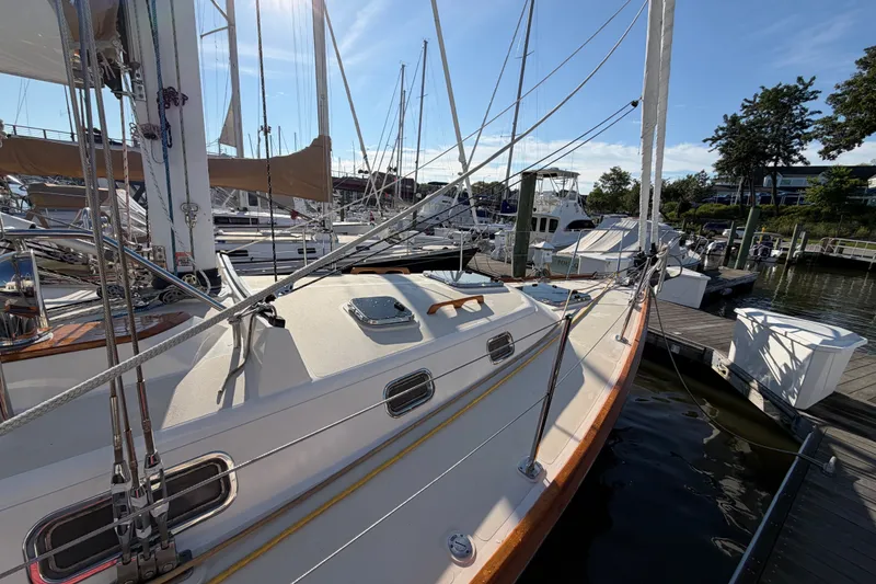 Slide: The Image of Sailboat docked at marina, Tartan 4300 model, 2011, sunny day, calm waters. - 30