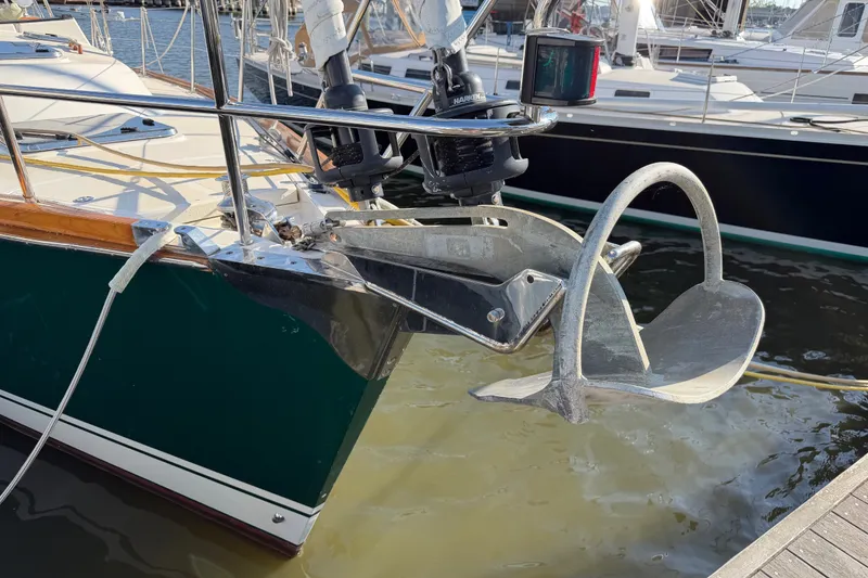 Slide: The Image of Tartan 4300 sailboat from 2011 with anchor at marina dock. - 31