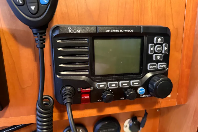Slide: The Image of VHF marine radio IC-M506 on Tartan 4300, 2011 model, mounted on wooden panel. - 26
