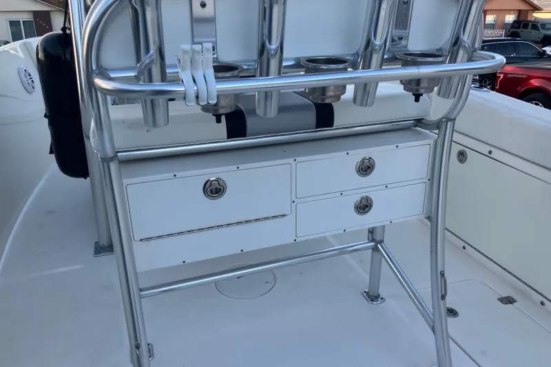 Slide: The Image of 2014 Century boat console with rod holders and storage drawers. - 10