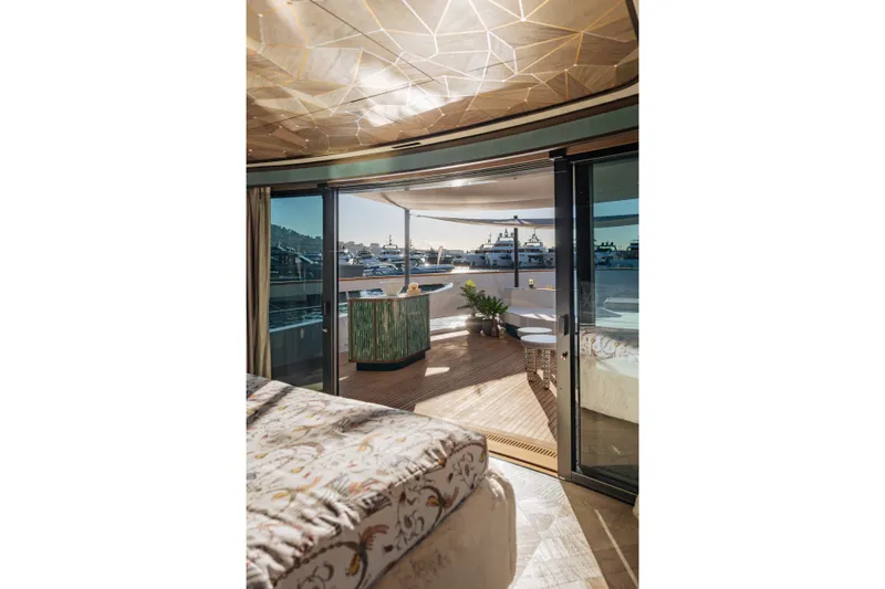 Slide: The Image of Luxurious Sirena 118 yacht interior with elegant decor and expansive ocean views, 2027 model. - 19