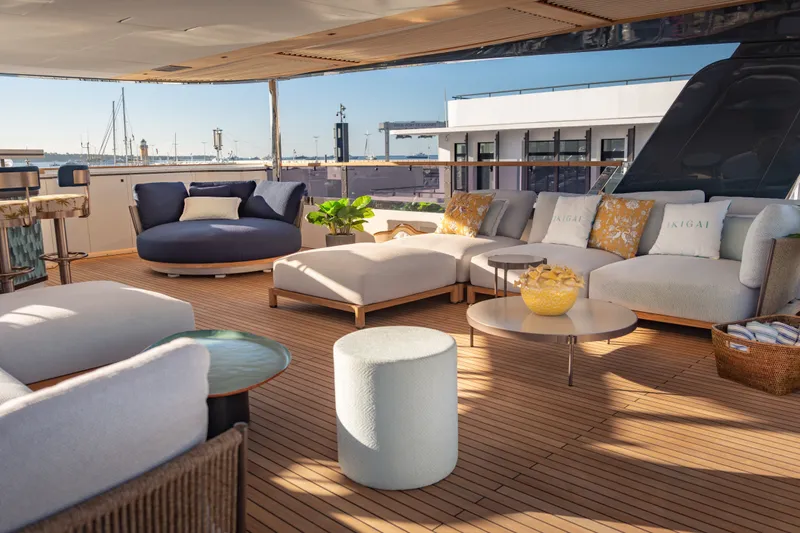 Slide: The Image of Luxurious outdoor seating on 2027 Sirena 118 yacht deck with modern furniture and ocean view. - 7