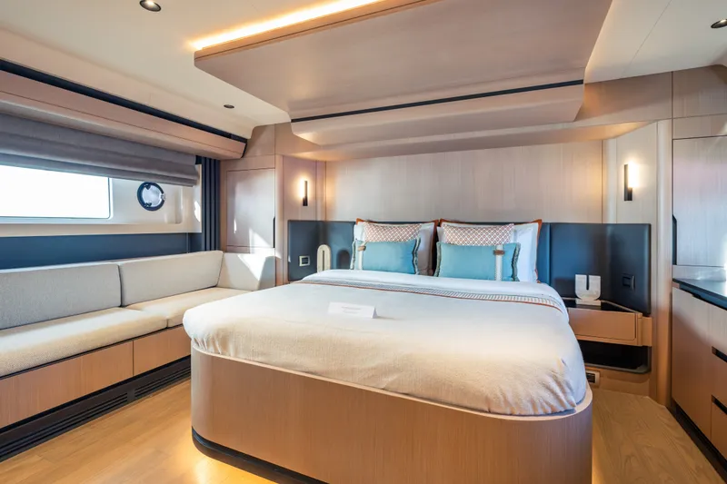 Slide: The Image of Luxurious Sirena 118 yacht bedroom interior, featuring modern design and elegant furnishings, 2027 model. - 29