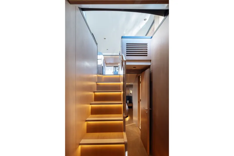 Slide: The Image of Modern interior staircase with ambient lighting on Sirena 118 yacht, 2027 model. - 23