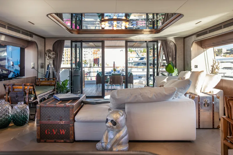 Slide: The Image of Luxurious Sirena 118 yacht interior, featuring elegant decor and spacious seating, 2027 model. - 22